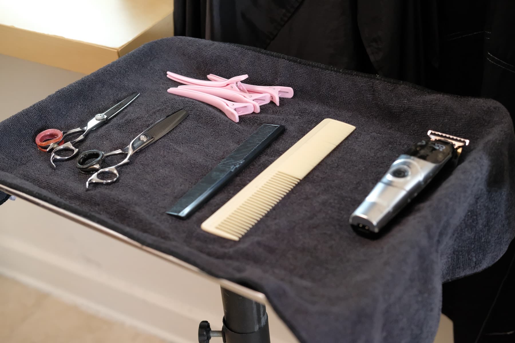 Professional haircutting tools prepared for a Cosmos Studio appointment